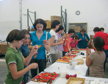 Kids tasting chocolates